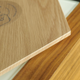 Here’s how the faux wood grain finish on the Elements line compares to actual wood.